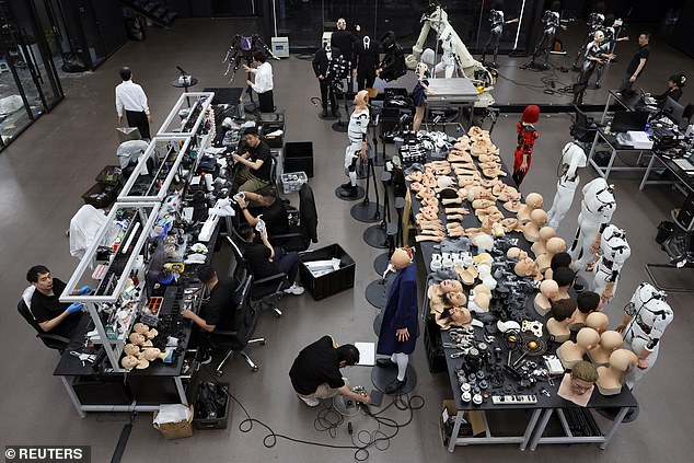 Terrifying footage from inside the Ex-Robots factory shows workers surrounded by piles of disembodied heads, neck-length silicone masks and spare limbs as they work to construct the most complex class of robotic products in the world