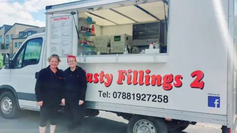 Jean Wall Jean Wall and her business partner Andrea Davey stood outside their mobile sandwich van