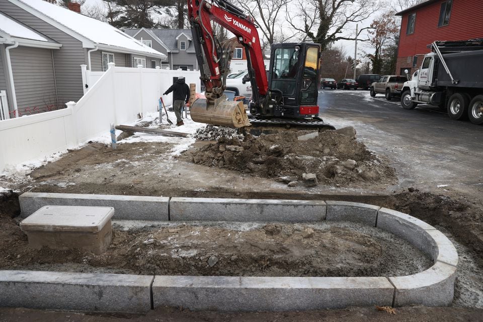 Construction proceeded over the winter to install an Electric Era EV charging station at a strip mall in Weymouth.