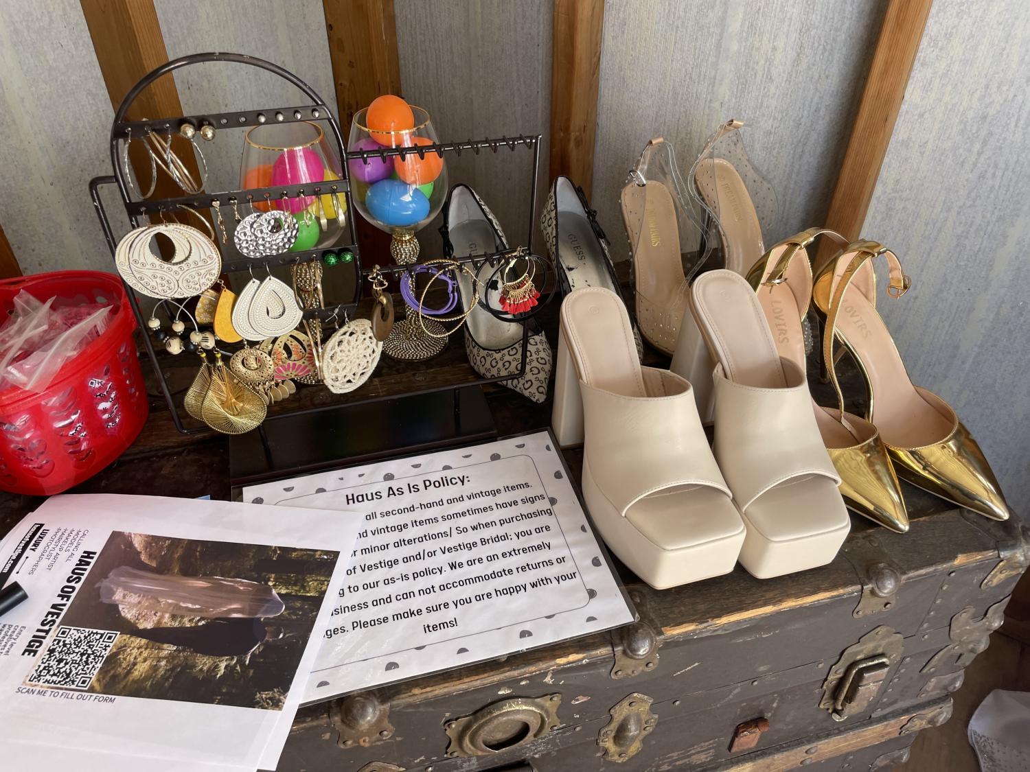 Shoes, earrings and other accessories for sale and on display.