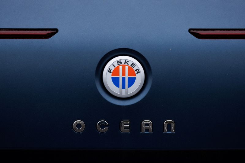 © Reuters. The Fisker logo is shown on the back of a Fisker Ocean electric SUV vehicle at one of the company’s sales, service ands delivery centers in Vista, California, U.S., May 22, 2024.   REUTERS/Mike Blake/file photo