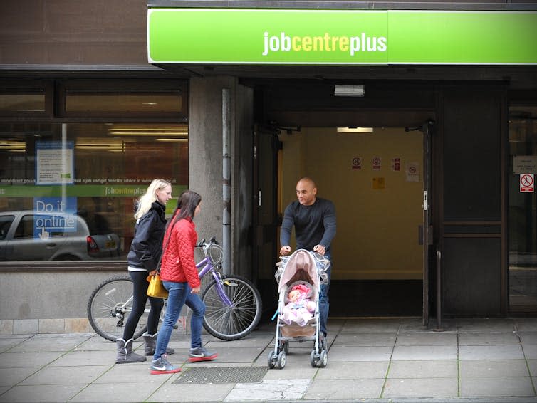 People outside a Jobcentre Plus building