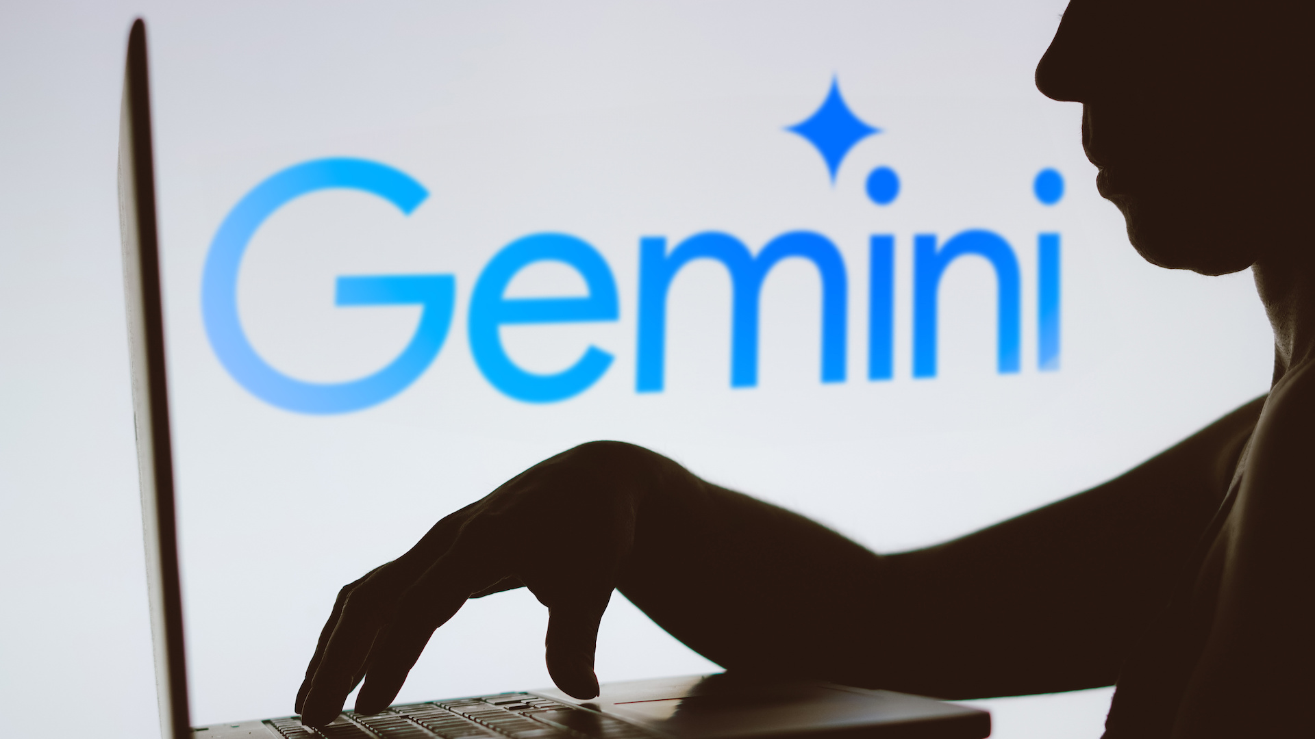 The silhouette of a man in front of the Gemini logo