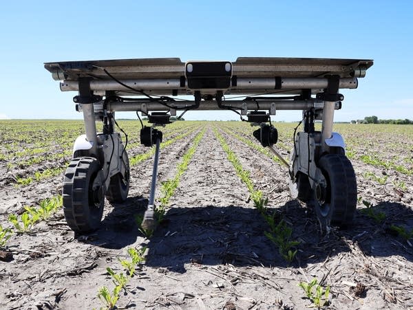 a small machine in a field 