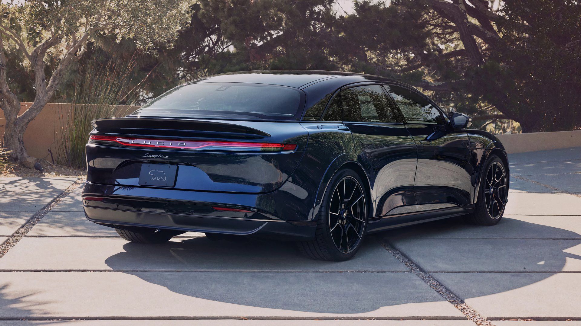 Rear three-quarters shot of a blue Lucid Air Sapphire 