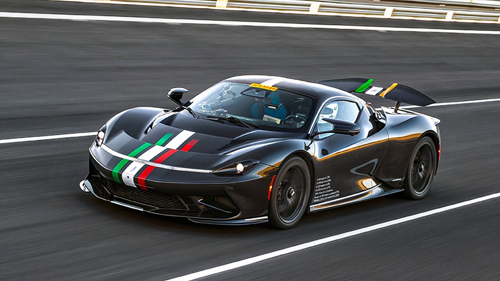 Front three-quarters shot of a Pininfarina Battista Hyper GT on the track