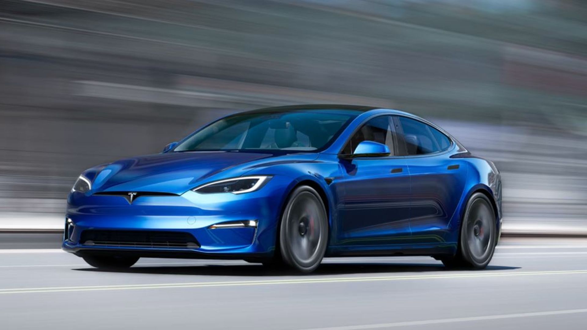 Blue Tesla Model S driving