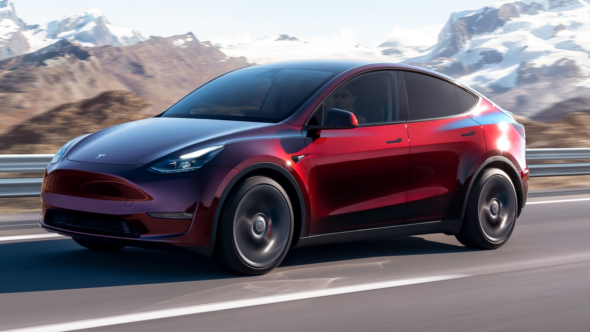 Red Tesla Model Y front-quarter